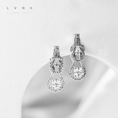 Round Invisible Setting Dangling Diamond Earrings 18kt